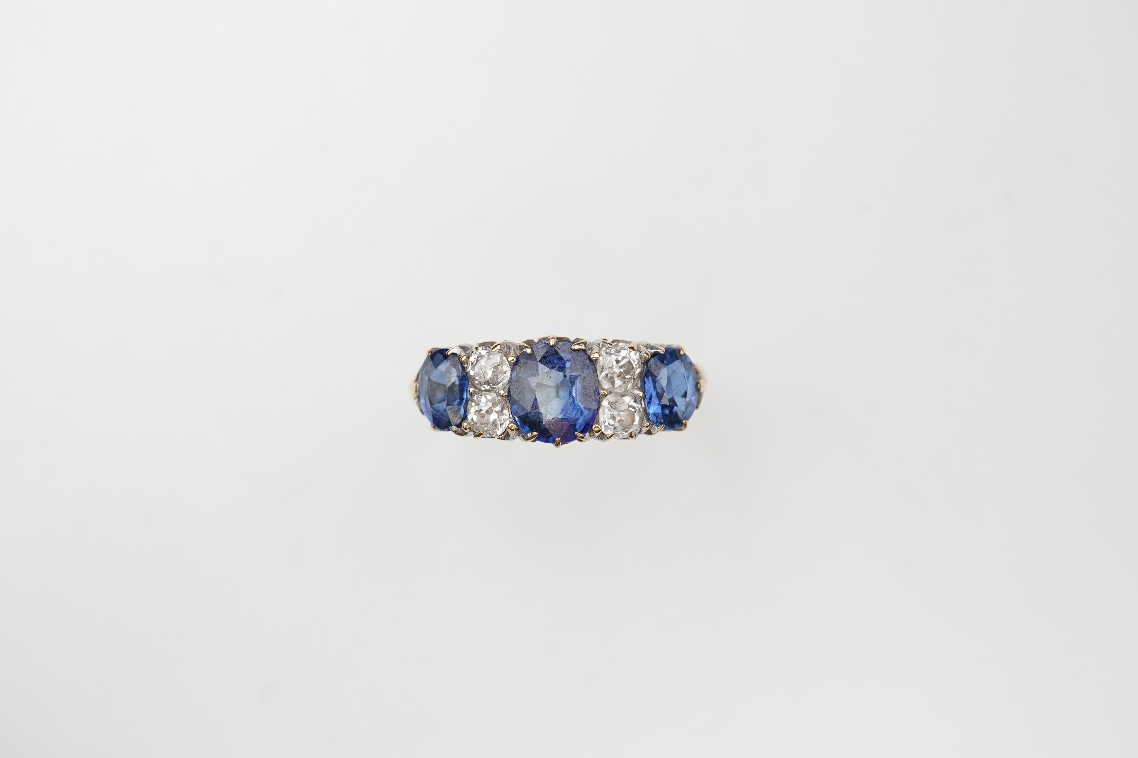 A Victorian sapphire and diamond ring, circa 1889
